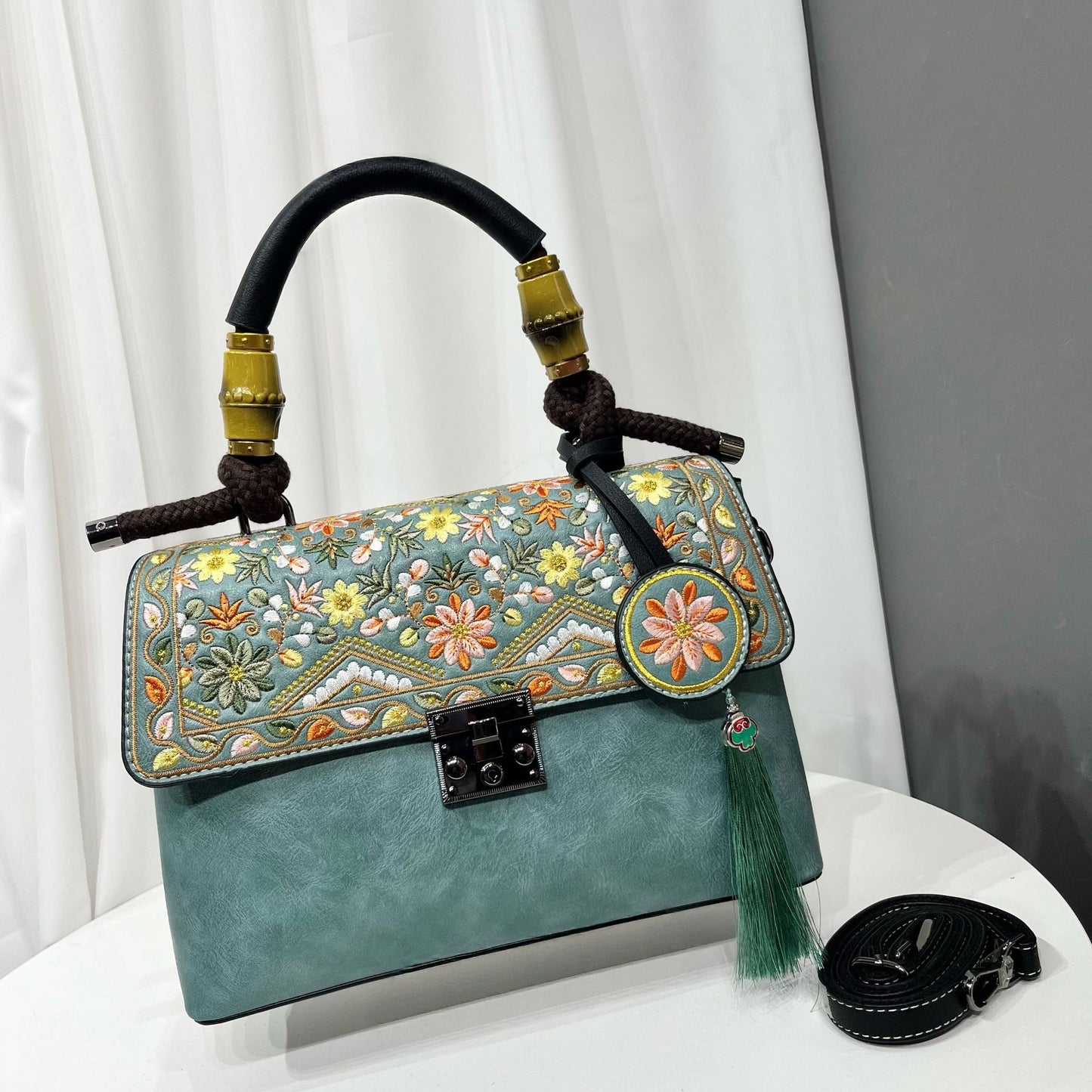 Casual Textured Large-Capacity Bag For Women, a stylish large capacity casual bag for women with floral embroidery.