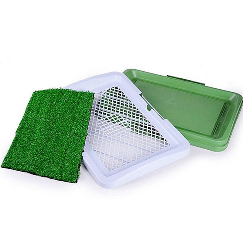 Splash proof puppy potty pad with green synthetic grass and drainage tray for easy cleaning.