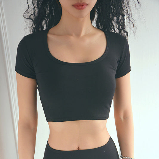 Black sports short sleeve vest displayed on a model, showcasing its cropped design and fitted style.