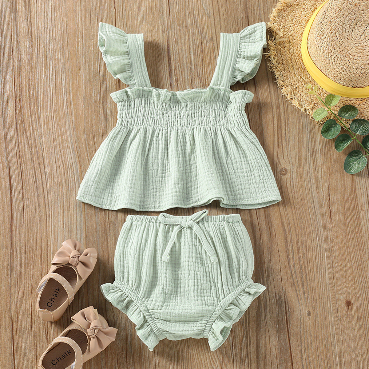 Girls' Solid Color Sling Top Shorts Set in green, featuring a ruffled top and matching hot pants.