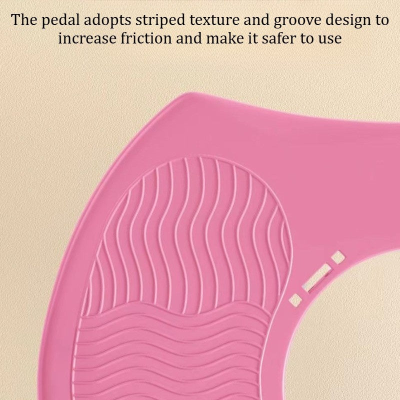 Close-up of pink pedal with striped texture and grooves for increased friction, enhancing safety for exercise equipment.