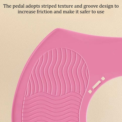 Close-up of pink pedal with striped texture and grooves for increased friction, enhancing safety for exercise equipment.