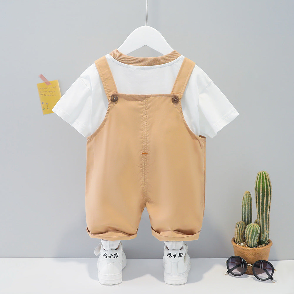 Baby summer cartoon overalls in beige with white short-sleeve shirt and stylish accessories for adventurous toddlers.