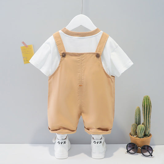 Baby summer cartoon overalls in beige with white short-sleeve shirt and stylish accessories for adventurous toddlers.