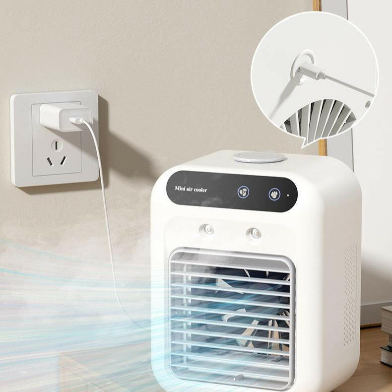 Portable Air Cooler Fan with Water Cooling plugged in, delivering refreshing airflow near a wall outlet.