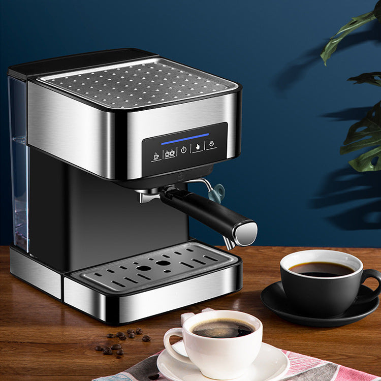 Home espresso machine with milk frother in a modern kitchen setting with cups of coffee.