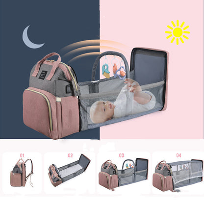 Large capacity mummy baby backpack with a baby inside and multiple features showcased in pink and gray design.