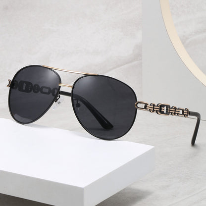 New Polarized Two-tone Plated Fashionable Hollow Out UV Protective Sunglasses on a display.