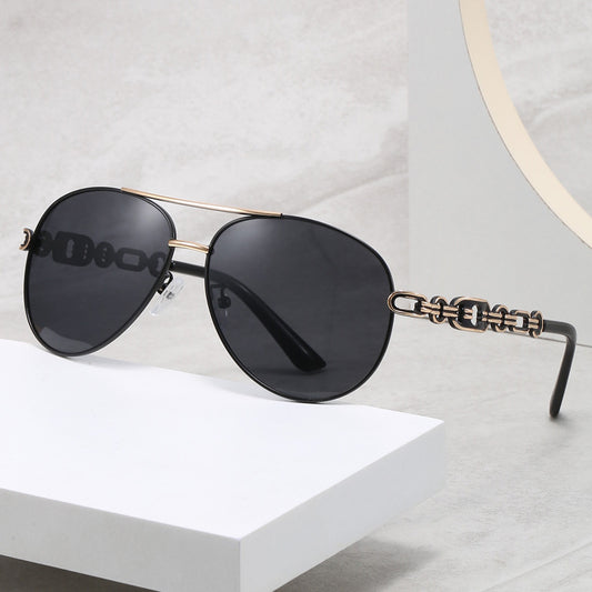 New Polarized Two-tone Plated Fashionable Hollow Out UV Protective Sunglasses on a display.