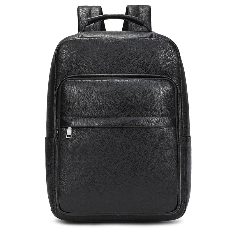 Men's genuine leather commuter backpack in black with textured finish and front pocket.