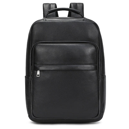 Men's genuine leather commuter backpack in black with textured finish and front pocket.