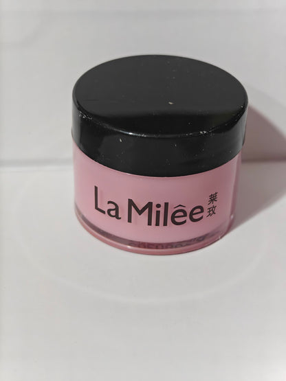 Moisturizing lip care products in a pink jar by La Milée for nourishing and hydrating lips.