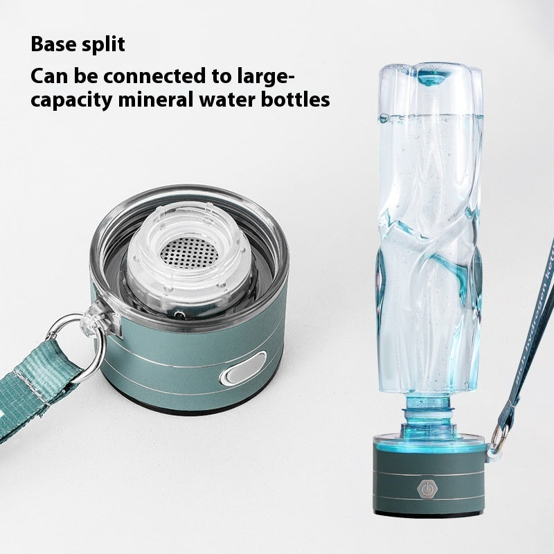 Portable kettle for mineral water bottles with base split feature and connected water bottle.