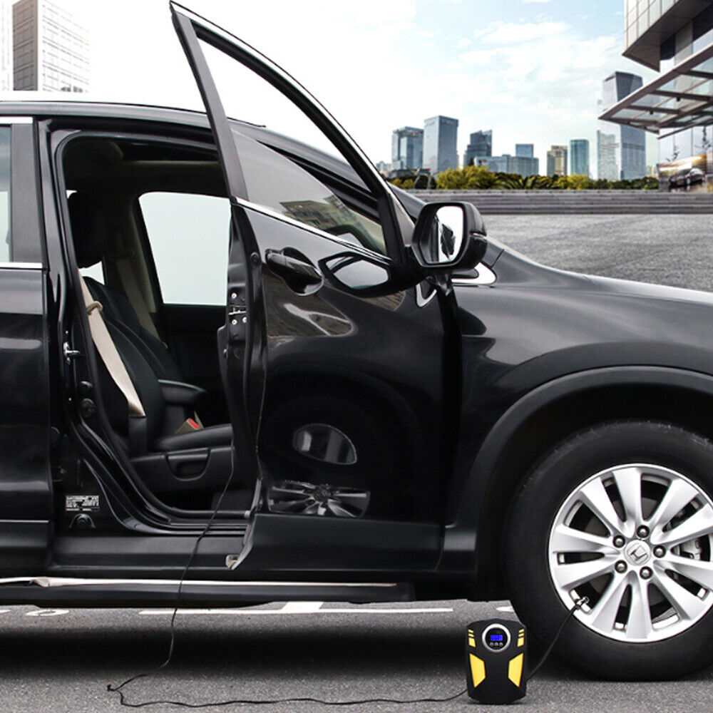 Portable digital tire inflator in use next to a car with an open door, showcasing convenience and accessibility.