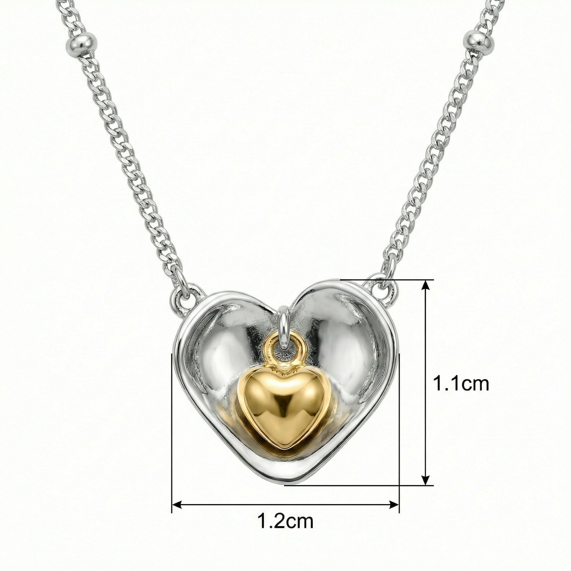 925 Sterling Silver Nested Heart Pendant Necklace with Two-Tone Accents, featuring a gold inner heart.