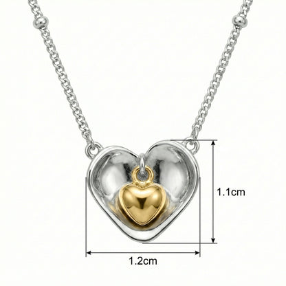 925 Sterling Silver Nested Heart Pendant Necklace with Two-Tone Accents, featuring a gold inner heart.