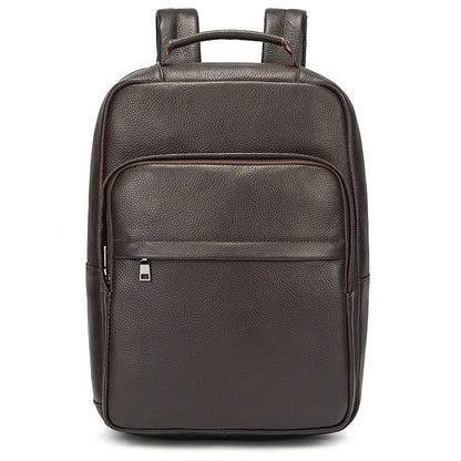 Men's genuine leather commuter backpack in solid brown cowhide design, featuring front pocket and curved straps.