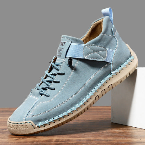 plus size leather casual boots in light blue, featuring a flat sole and mid-top design.