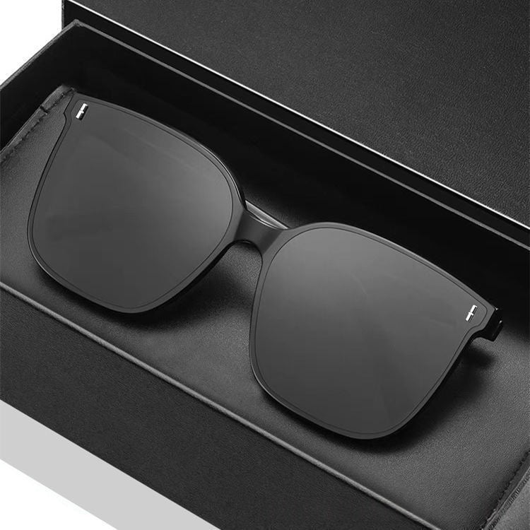 Mens And Womens Trendy Instagram-style Sunglasses in sleek black color with gray lenses displayed in a box.
