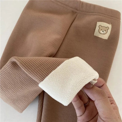 fleece-lined girls leggings in brown with plush lining and bear patch detail