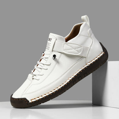 White plus size leather casual boots with mid-top design and flat sole, perfect for spring and summer.
