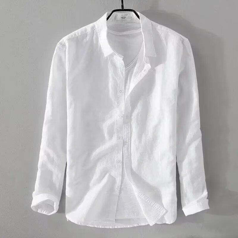 slim fit casual cardigan for teenagers in white hanging on a gray wall.
