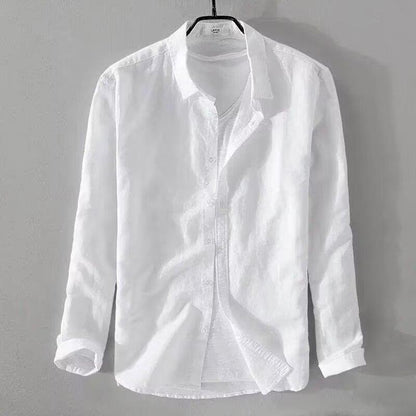 slim fit casual cardigan for teenagers in white hanging on a gray wall.