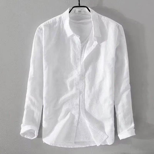 slim fit casual cardigan for teenagers in white hanging on a gray wall.