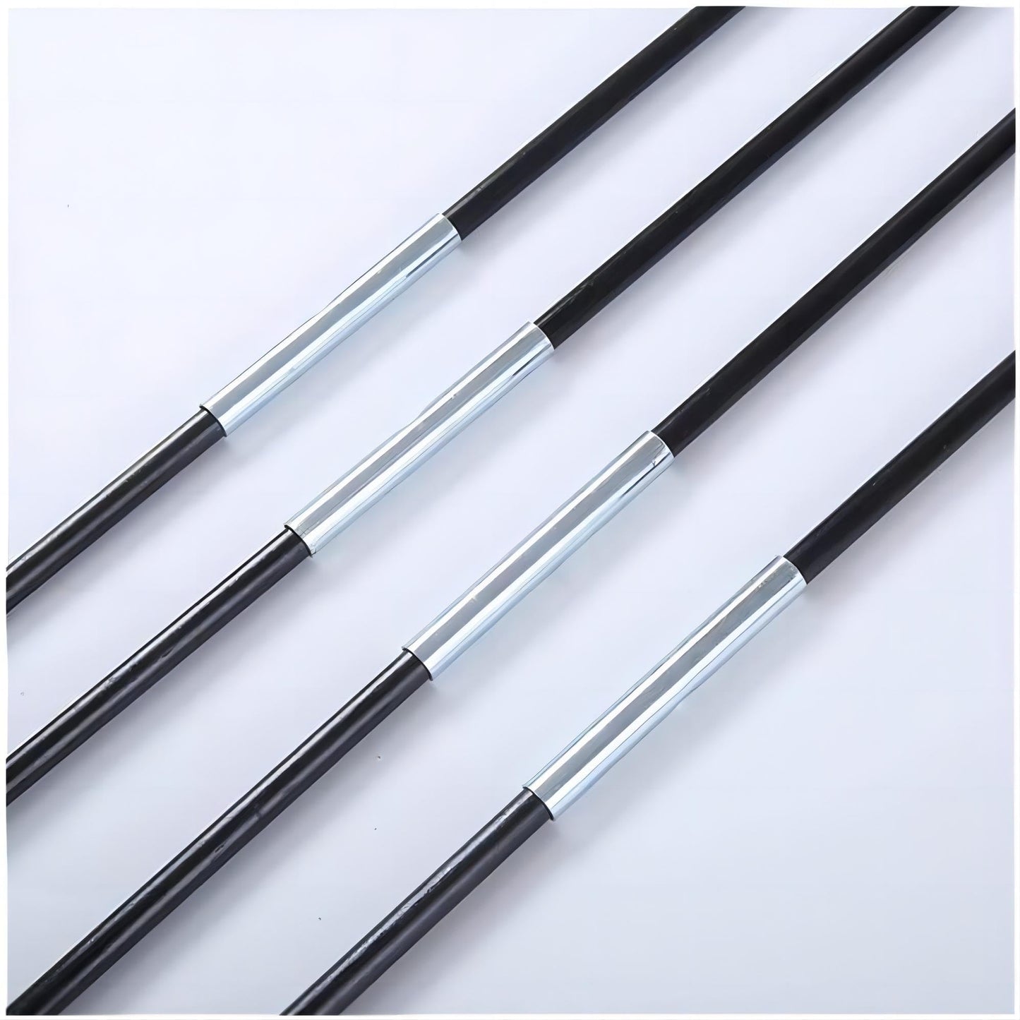 Black poles with silver connectors for portable kids play tent assembly.