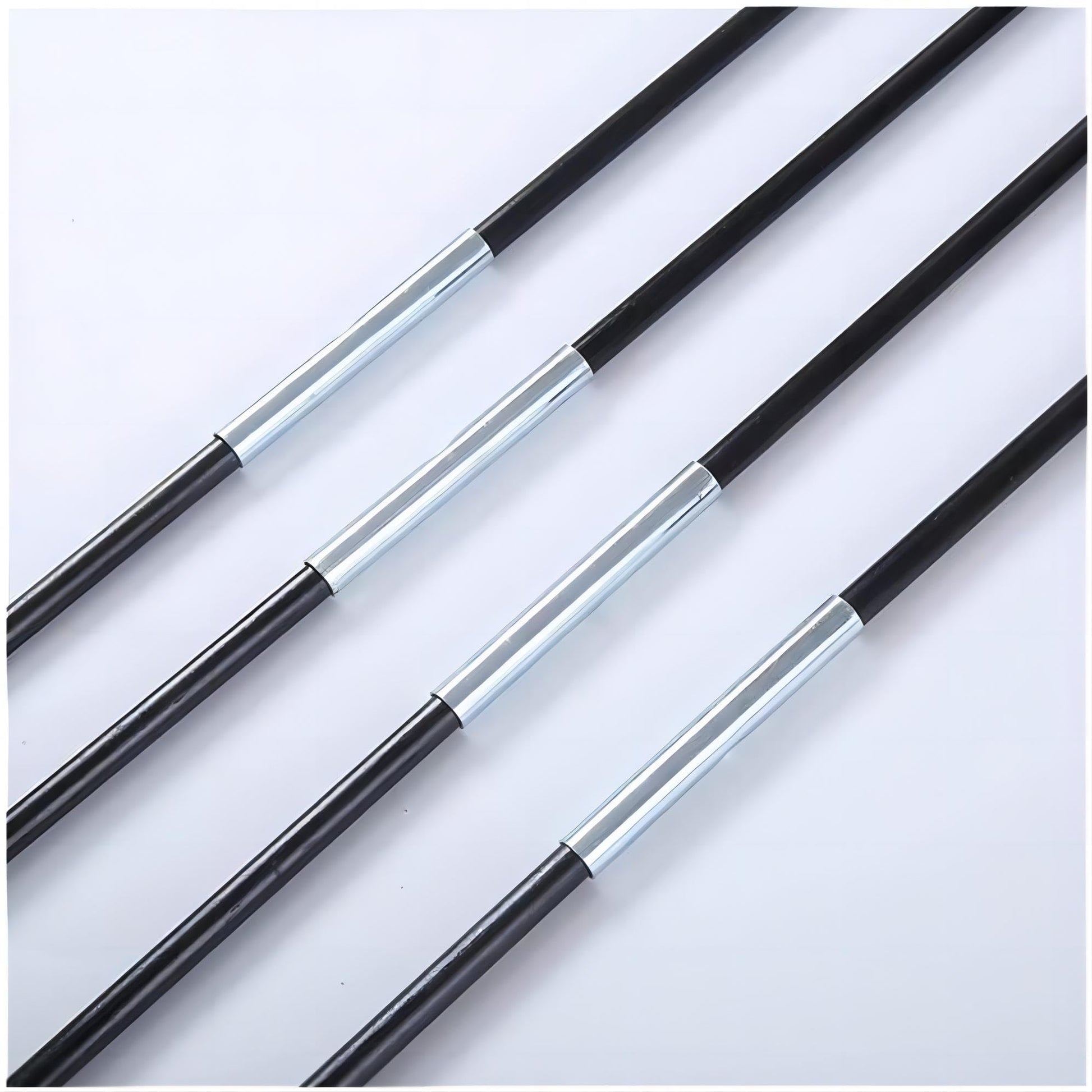 Black poles with silver connectors for portable kids play tent assembly.