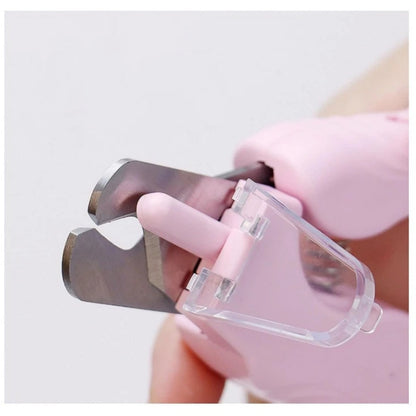 Close-up of white pet nail trimmer with light, showcasing precision cutting edge and ergonomic design for pets.