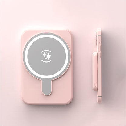 Mini Magnetic Power Bank 5000mAh Wireless in sleek pink design with magnetic suction feature.