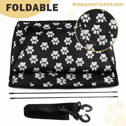 Portable dog car seat for small pets made of waterproof Oxford cloth with paw print design, foldable for easy storage.