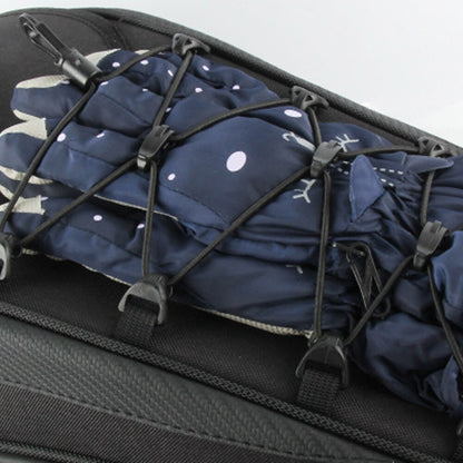 Motorcycle rear seat tail bag with gloves secured by elastic straps for safe storage while riding.
