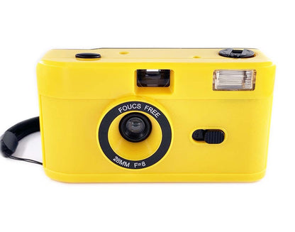 Non-disposable retro film camera in yellow with focus free feature and built-in flash.