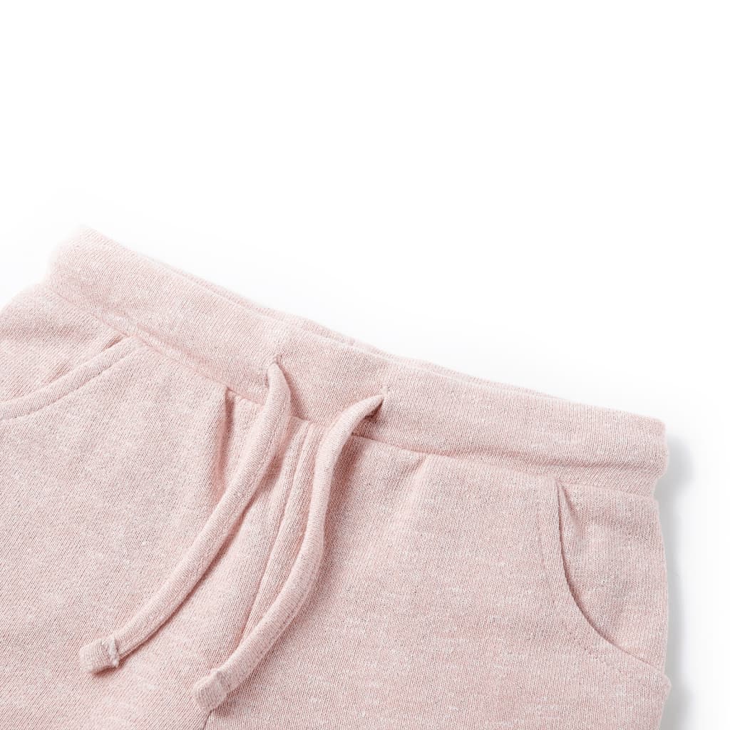 Light pink children's shorts with drawstring featuring an elasticated waistband and inset front pockets.